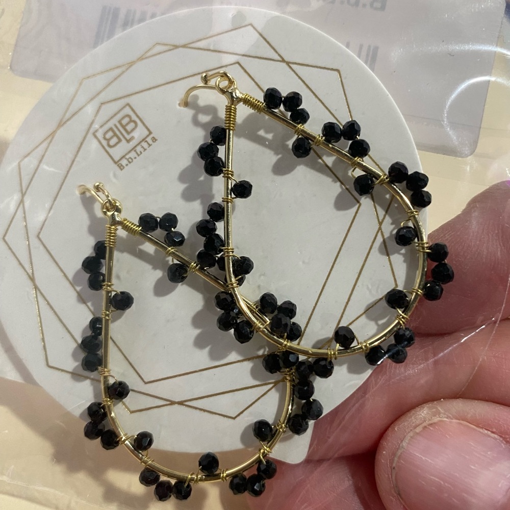 BB Lila earrings. Gold tone hoop earrings with black beads. NWT